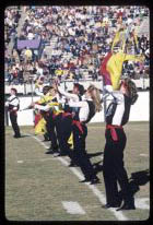 Colorguard performing in Ficklen Stadium